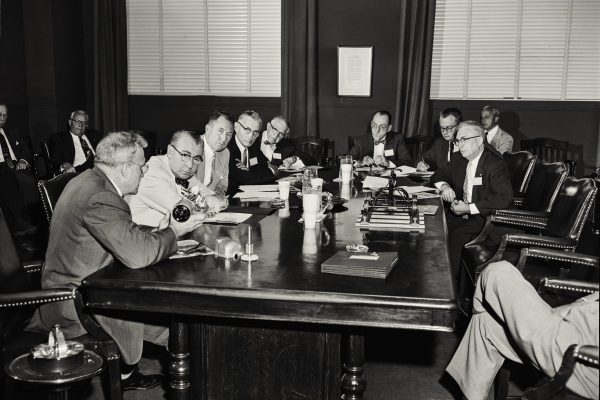 Ralph Presents 
"Speedostat" at Press
   Conference - 1957